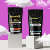 Gigawatt Coffee Half Caff Coffee, bestselling blend of decaf water processed coffee and medium dark roast, smooth and balanced taste. 10 oz, set against a cloud-filled background.