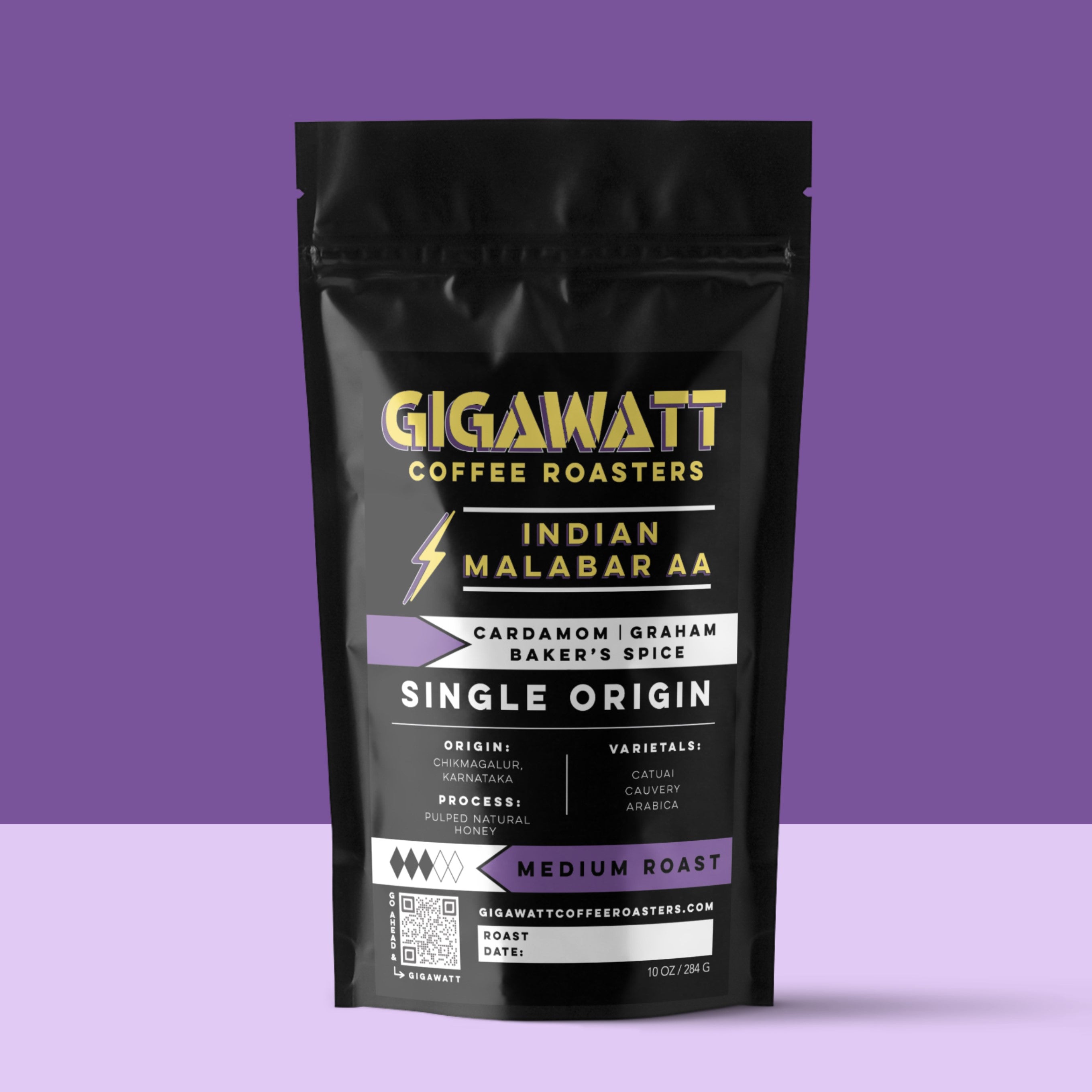 Gigawatt Coffee Indian Malabar AA, freshly roasted small batch medium roast with smooth taste. Single origin, 10 oz, displayed on a counter.