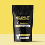 Gigawatt Coffee Live Wire Espresso Blend, freshly roasted small batch dark roast with smooth, balanced taste. Arabica espresso blend, 10 oz, displayed on a counter. Perfect for espresso coffee.