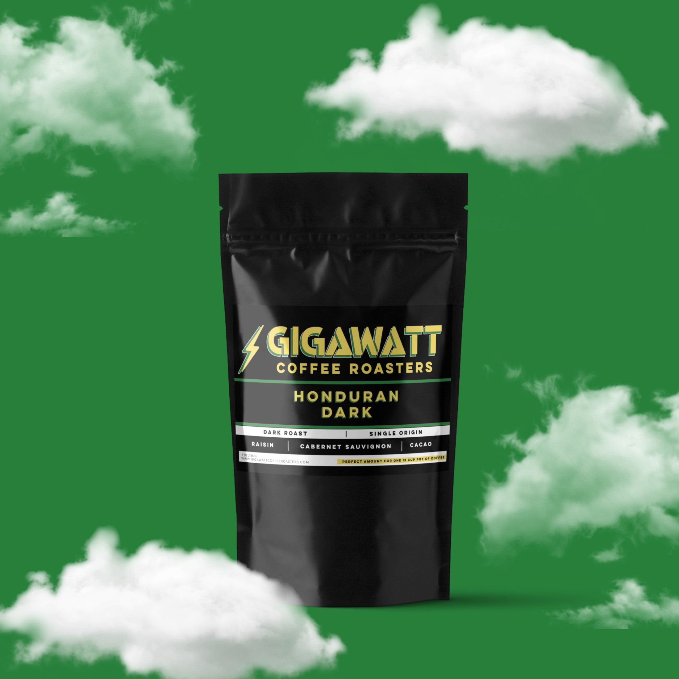 Gigawatt Coffee Organic Honduran Dark Roast, bold and smooth single origin dark roast coffee. 3 oz coffee sampler pack, set against a cloud-filled background.