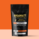 Gigawatt Coffee Static Resistor Decaf, water processed Colombian dark roast, freshly roasted small batch with smooth, full-bodied taste. Decaf coffee, 10 oz, displayed on a counter.