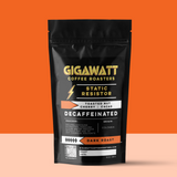 Gigawatt Coffee Static Resistor Decaf, water processed Colombian dark roast, freshly roasted small batch with smooth, full-bodied taste. Decaf coffee, 10 oz, displayed on a counter.